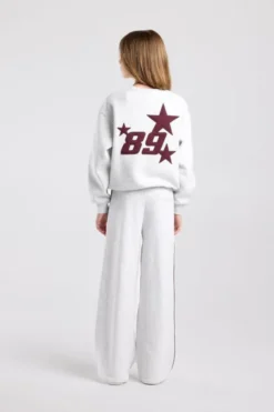 America Today Truien & Vesten|New In^sweater Stazie Jr Oversized sweater met front en back patch